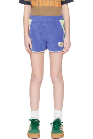 Bobo Choses Enfant | Short bleu en tissu éponge à garnitures contrastantes à logo Smiling