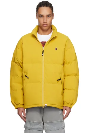 BAPE Blouson jaune rembourré en duvet à écusson à logo