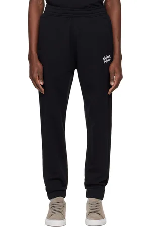 Maison Kitsuné Pantalon de survêtement noir à logo calligraphié