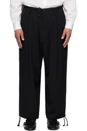 YOHJI YAMAMOTO Pantalon noir en laine à plis et à cordons coulissants - POUR HOMME
