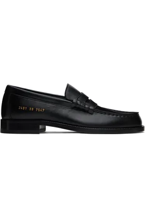 COMMON PROJECTS Flâneurs noirs en cuir grainé