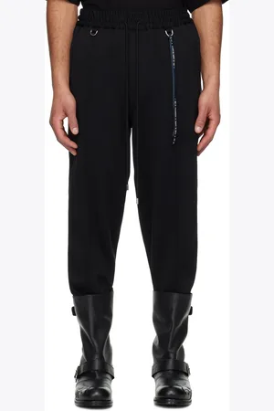 MASTERMIND JAPAN Pantalon de survêtement fuselé noir en jersey à garnitures de style ruban à crânes