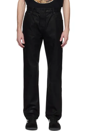 Balmain Jean à coupe classique noir en denim enduit
