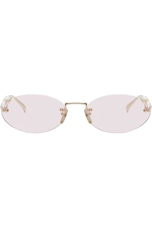 Gucci Lunettes de soleil ovales dorées