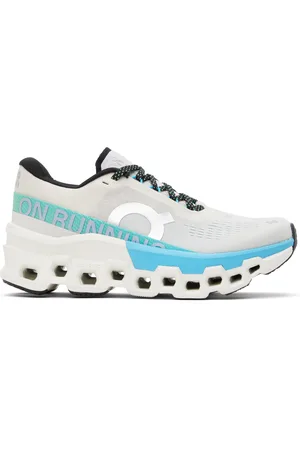 On Running Baskets Cloudmster 2 blanc cassé et bleu