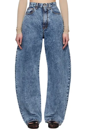 Alaïa Jean bleu à coutures extérieures incurvées
