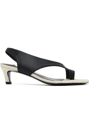 Totême Sandales à talon noir et beige en cuir à bride de style tong