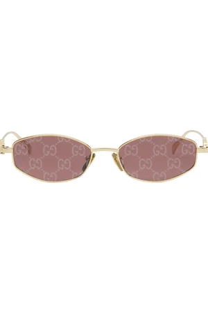 Gucci Lunettes de soleil ovales dorées