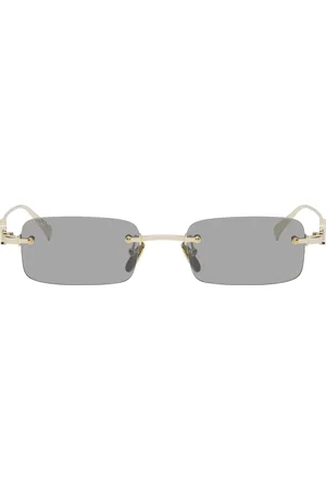 Gucci Lunettes de soleil rectangulaires dorées à ferrures à logo