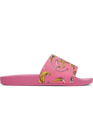 VERSACE Sandales à enfiler roses à motif Outline Barocco