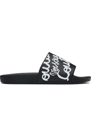 VERSACE Sandales à enfiler Shelly noires à logo