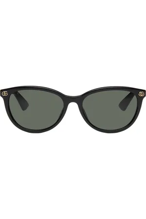 Gucci Lunettes de soleil ovales noires en acétate léger à logos GG