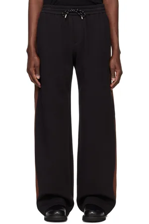 SYSTEM Pantalon de survêtement noir à passepoils