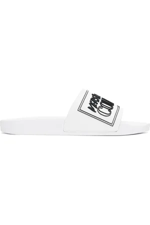 VERSACE Sandales à enfiler Shelly blanches à logo