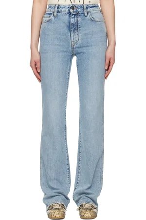 AMIRI Jean ajusté bleu à appliqué à quadrigramme
