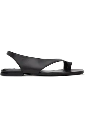 Totême Sandales noires en cuir à bride de style tong