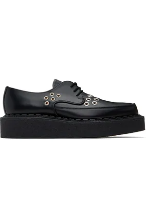 Comme des Garçons Derbys Diano noirs à œillets édition George Cox