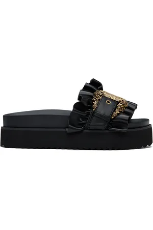 VERSACE Sandales Arizona noires à boucle Baroque