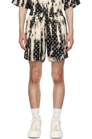 AMIRI Short noir à effet décoloré et à motifs