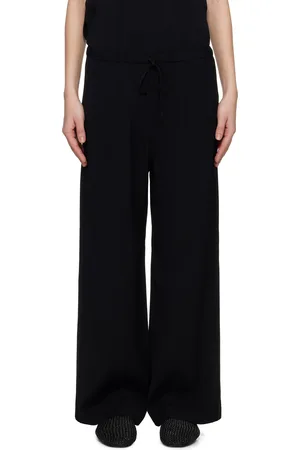 Totême Pantalon noir à rayures et à cordon coulissant