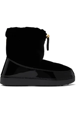 Giuseppe Zanotti Bottes matelassées noires exclusives à SSENSE