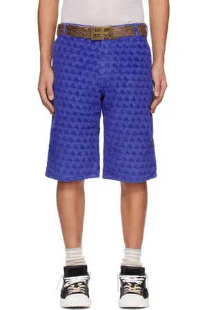 ERL Short bleu à motif à logo imprimé