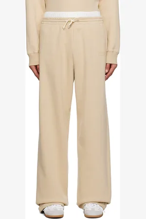 Maison Margiela Pantalon de survêtement beige à logo imprimé