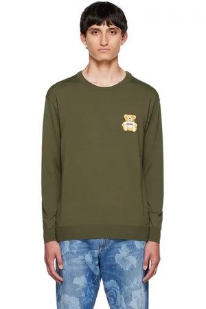 Moschino Pull vert à écusson graphique