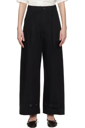 Issey Miyake Pantalon noir à plis pressés