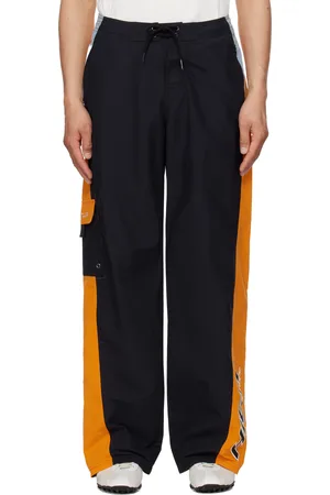 MARTINE ROSE Pantalon de survêtement de style maillot de bain noir et orange