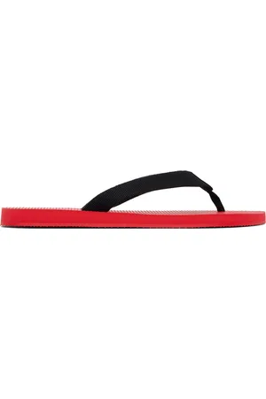 The Row Tongs Dune noir et rouge