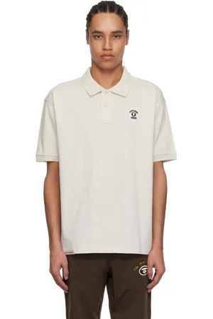 A Bathing Ape Polo beige à logos