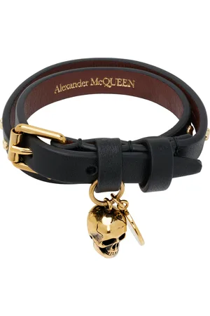 Alexander McQueen Bracelet double tour noir à clous martelés