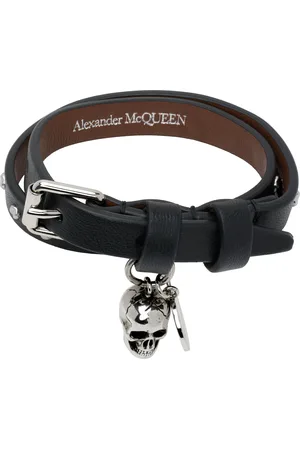 Alexander McQueen Bracelet double tour noir à clous martelés