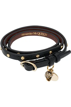 Alexander McQueen Bracelet double tour noir à clous martelés