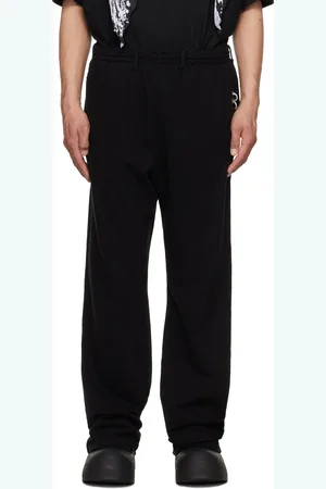We11 Done Pantalon de survêtement noir à perçages