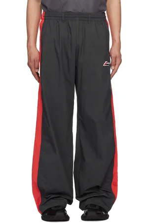 We11 Done Pantalon de survêtement contrasté gris et rouge à logo Selldone