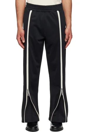 Palm Angels Pantalon de survêtement noir à glissières