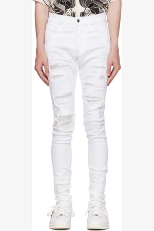 AMIRI Jean blanc à ornements en verre taillé