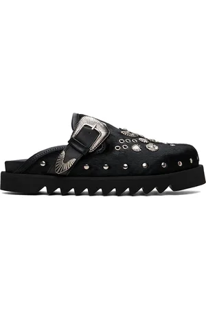 TOGA VIRILIS Flâneurs de style sabot à enfiler noirs à ornements en métal exclusifs à SSENSE