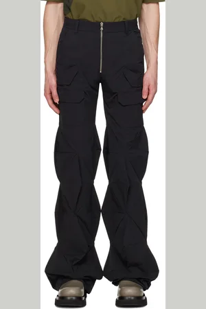 Uncertain Factor Pantalon cargo noir à panneaux sculpturaux