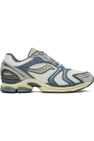 Saucony Baskets Triumph 4 blanc et bleu à technologie ProGrid