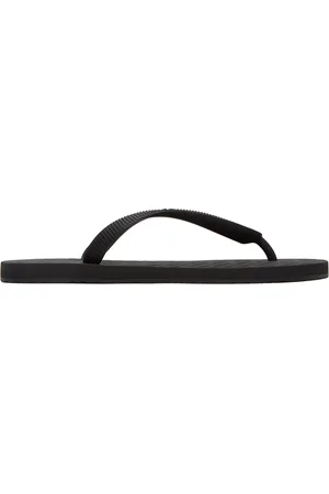 Vetements Tongs noires à logo gaufré