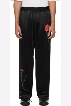 SONG FOR THE MUTE Pantalon de survêtement noir à images de fleur