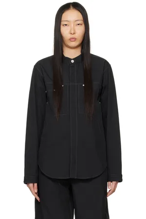 DION LEE Blouson noir en denim à rivets