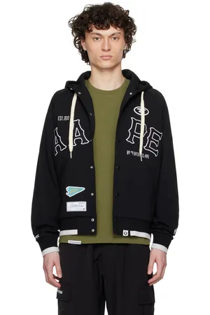 A Bathing Ape Blouson noir à glissière et à écussons à logo