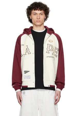 A Bathing Ape Blouson blanc cassé et bourgogne à glissière et à écussons à logo