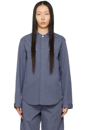 DION LEE Blouson bleu en denim à rivets