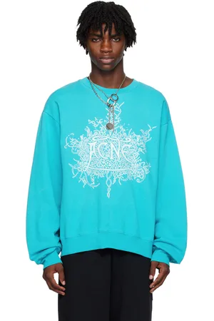 Acne Studios Pull molletonné bleu à image à logo phosphorescente