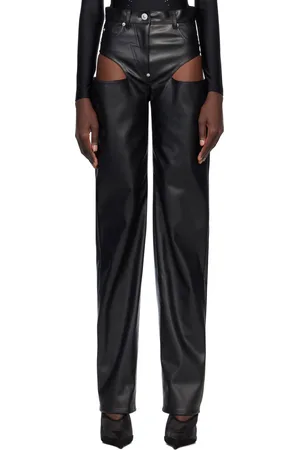 pushBUTTON Pantalon noir en cuir synthétique à découpes latérales